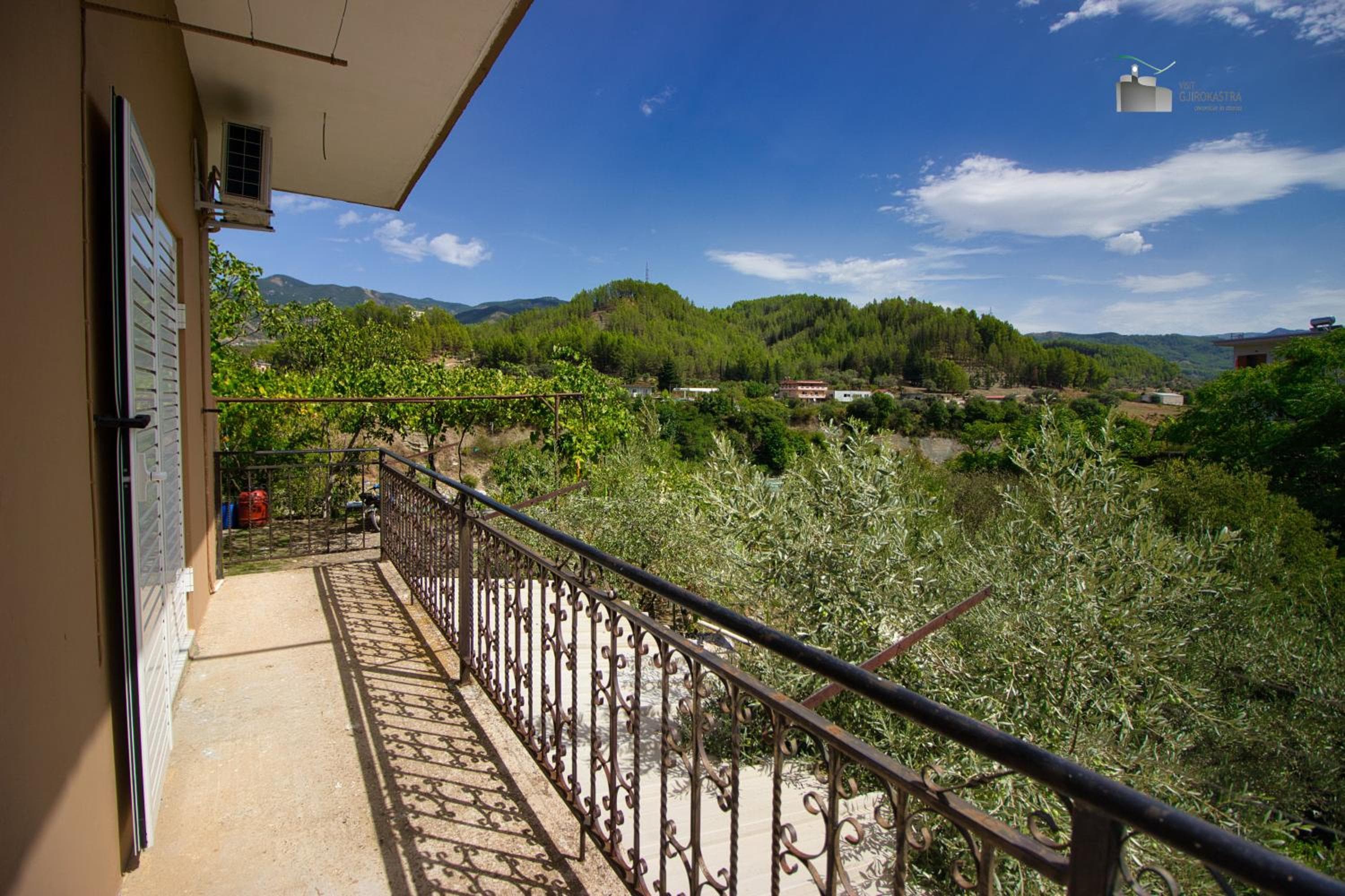 The guesthouse balcony over the valley