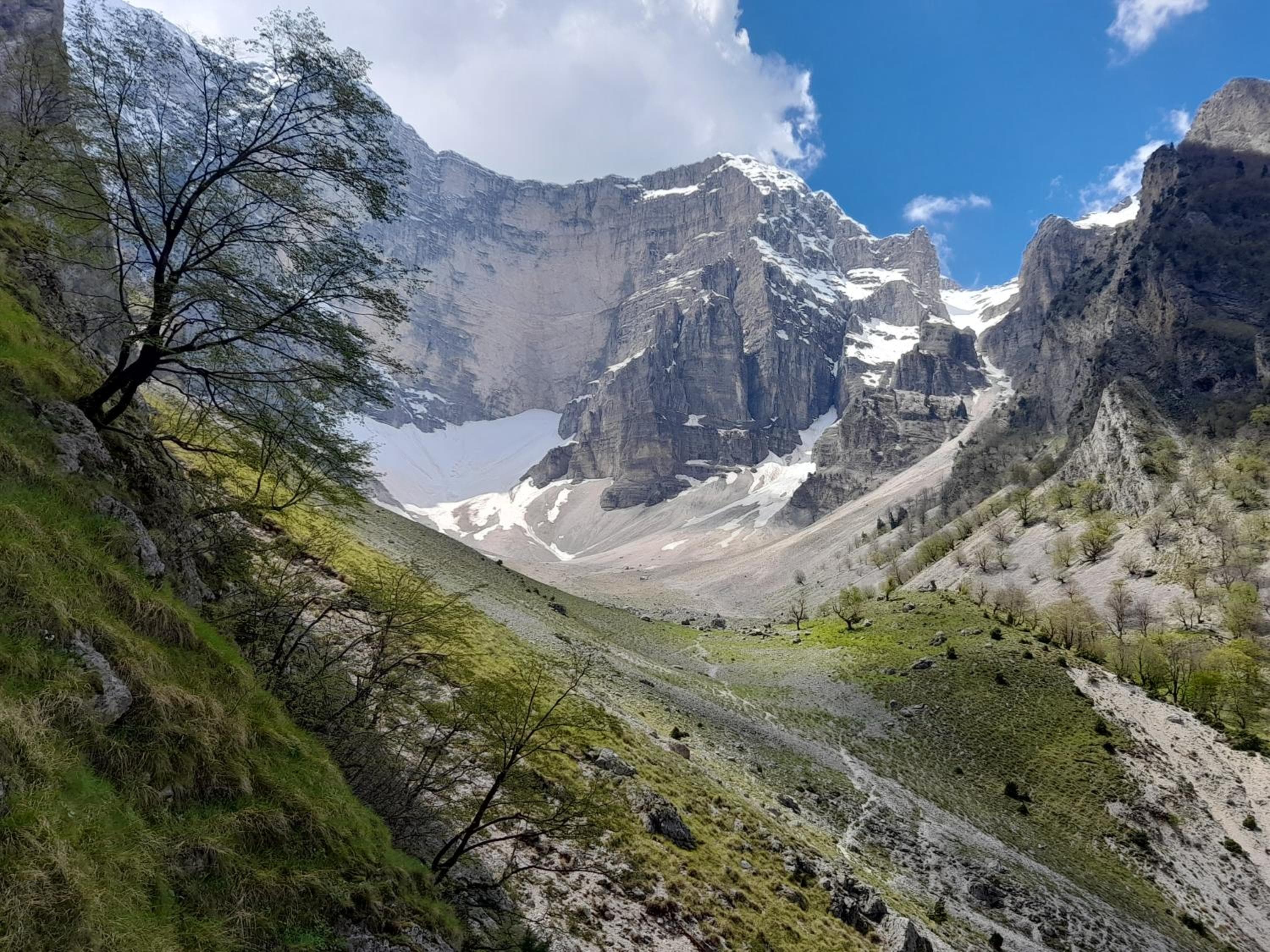Snow still lying under the summit ridge in spring