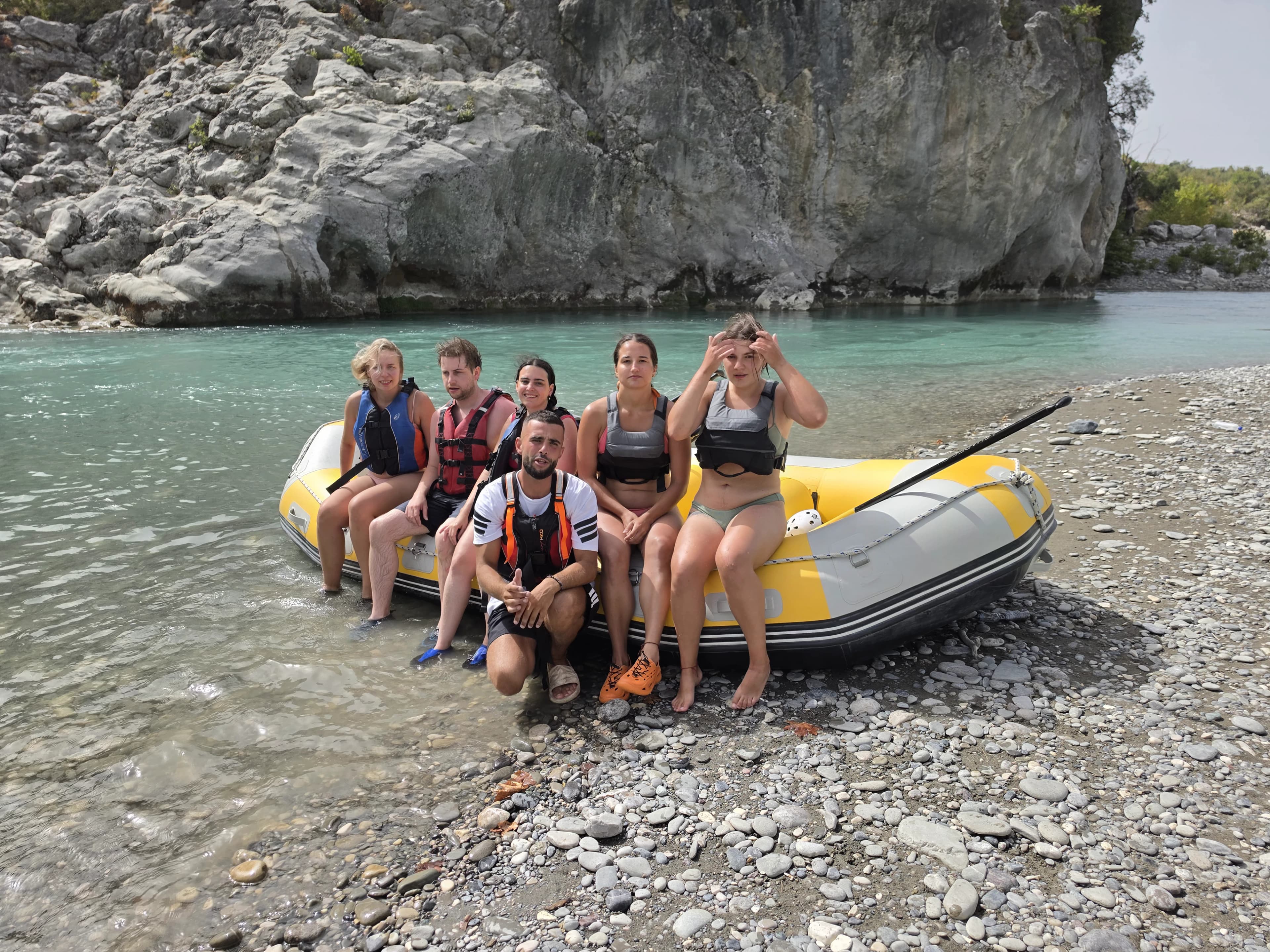 A raft below a limestone wall on the Vjosa